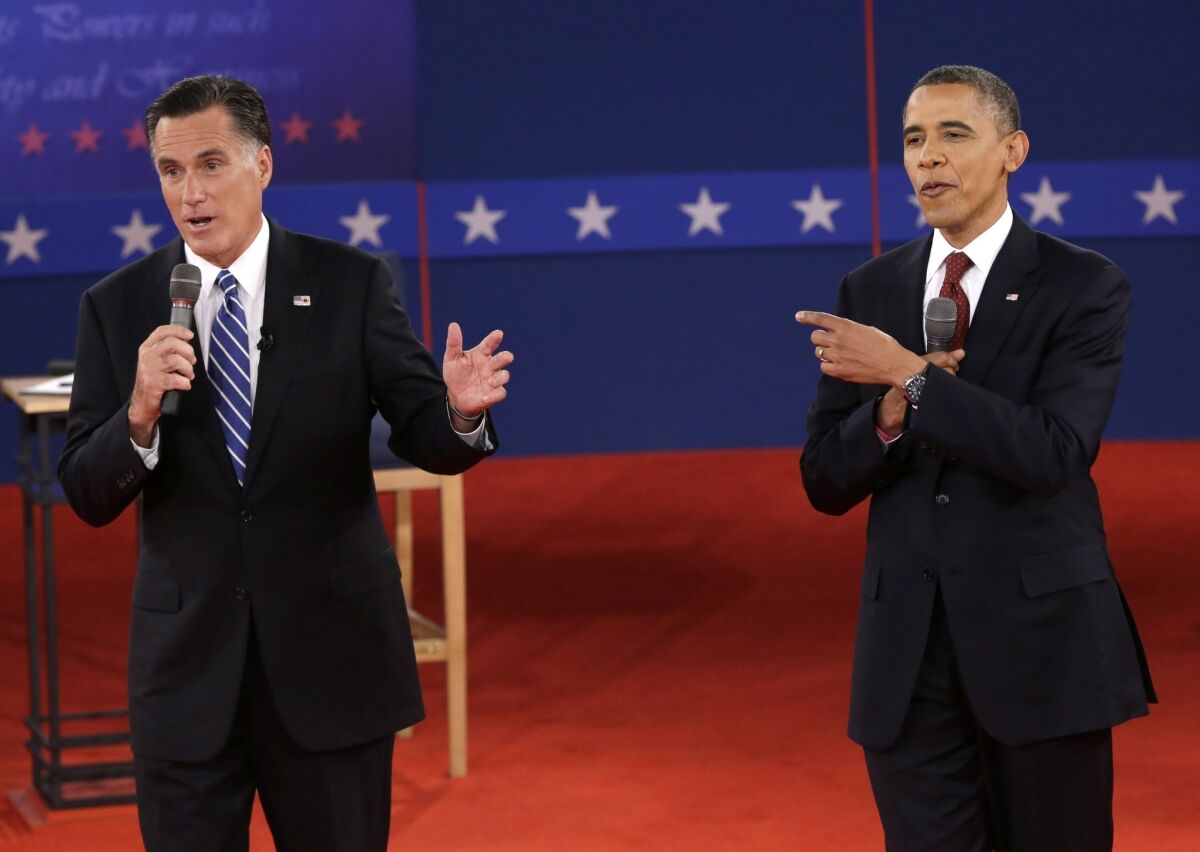 President Obama and Republican presidential nominee Mitt Romney exchange views during the second presidential debate at Hofstra University in Hempstead, N.Y.