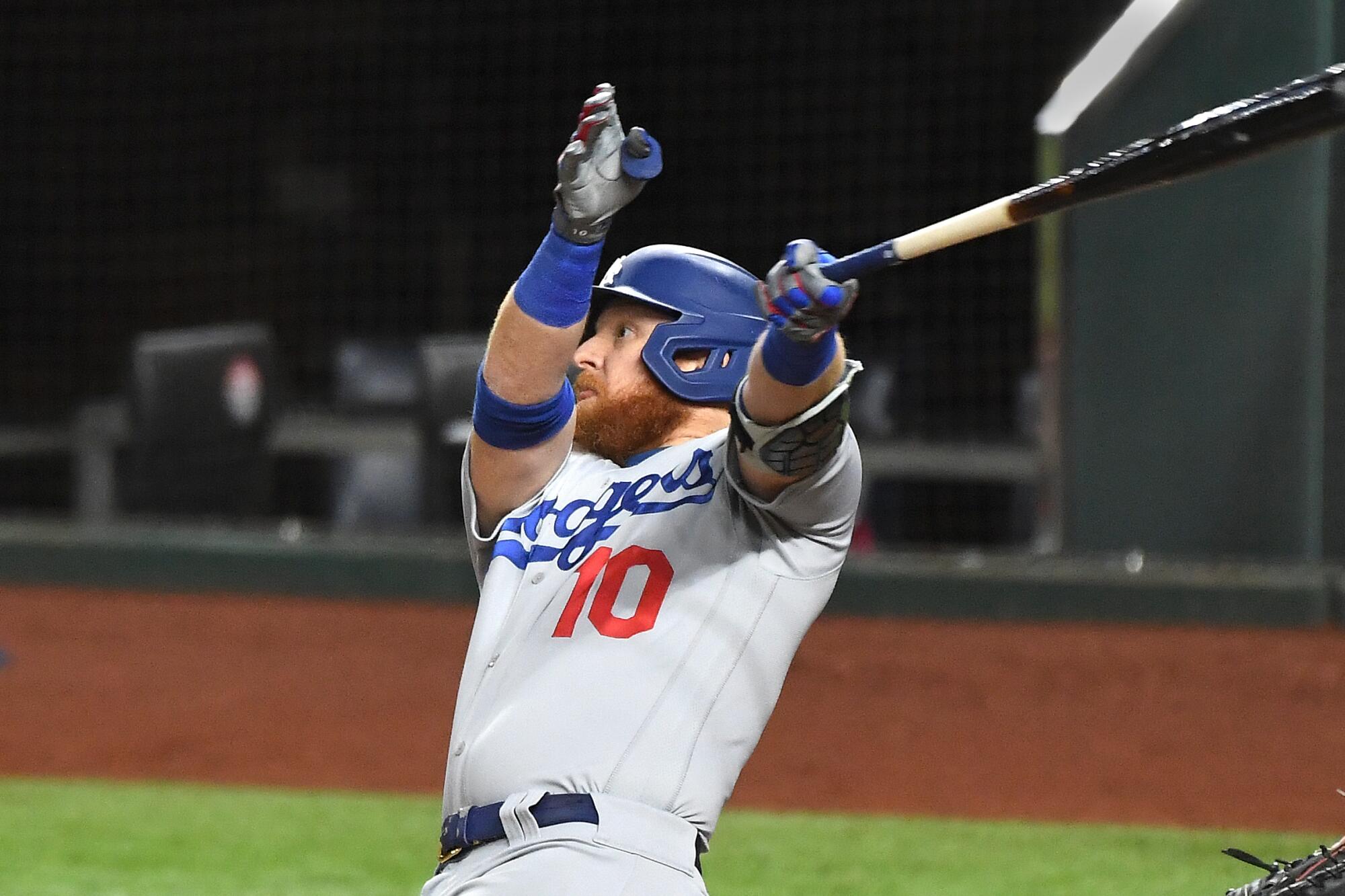 Dodgers third baseman Justin Turner hits a solo home run in the first inning of Game 3.