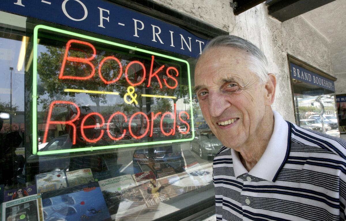 Jerome Joseph, owner of the Brand Bookstore, poses for a photo in this July 2008 file photo. Joseph, who owned the bookstore in Glendale for nearly three decades until the shop closed a year ago this month, has died after a protracted series of illnesses. He was 87.