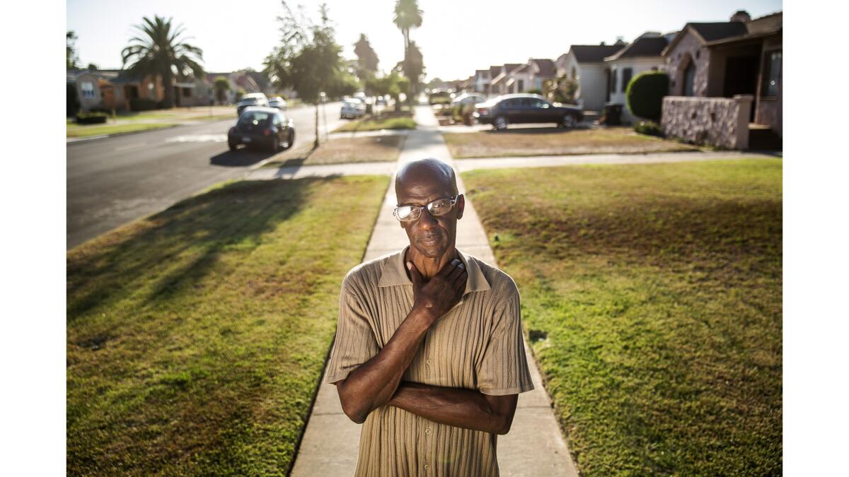 Former gang member Melvin Farmer on the street where he grew up.