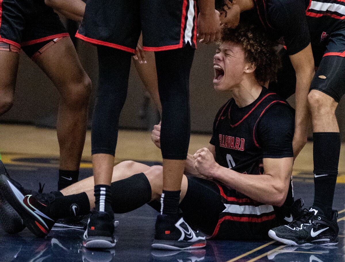 Sherman Oaks, CA - January 18: Harvard-Westlake High School point guard Trent Perry celebrates being fouled on a basket 