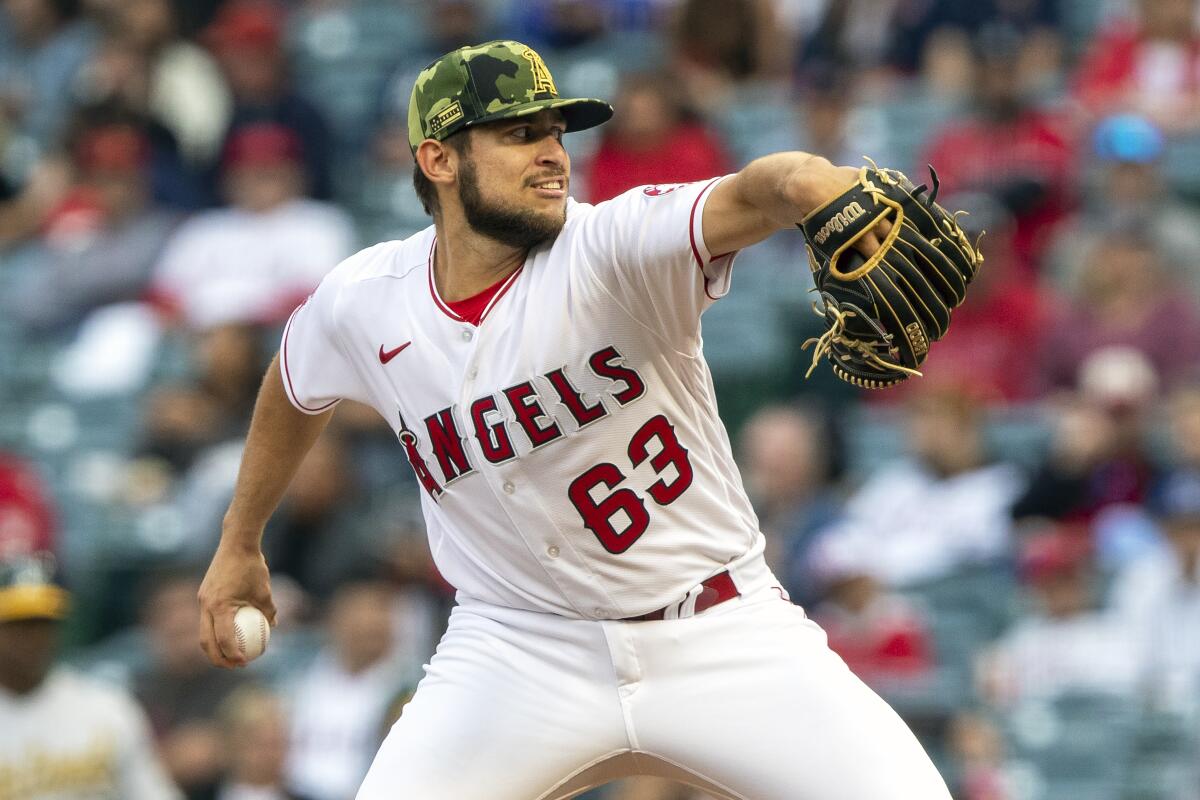 Angels starting pitcher Chase Silseth delivers during the first inning against the Oakland Athletics.