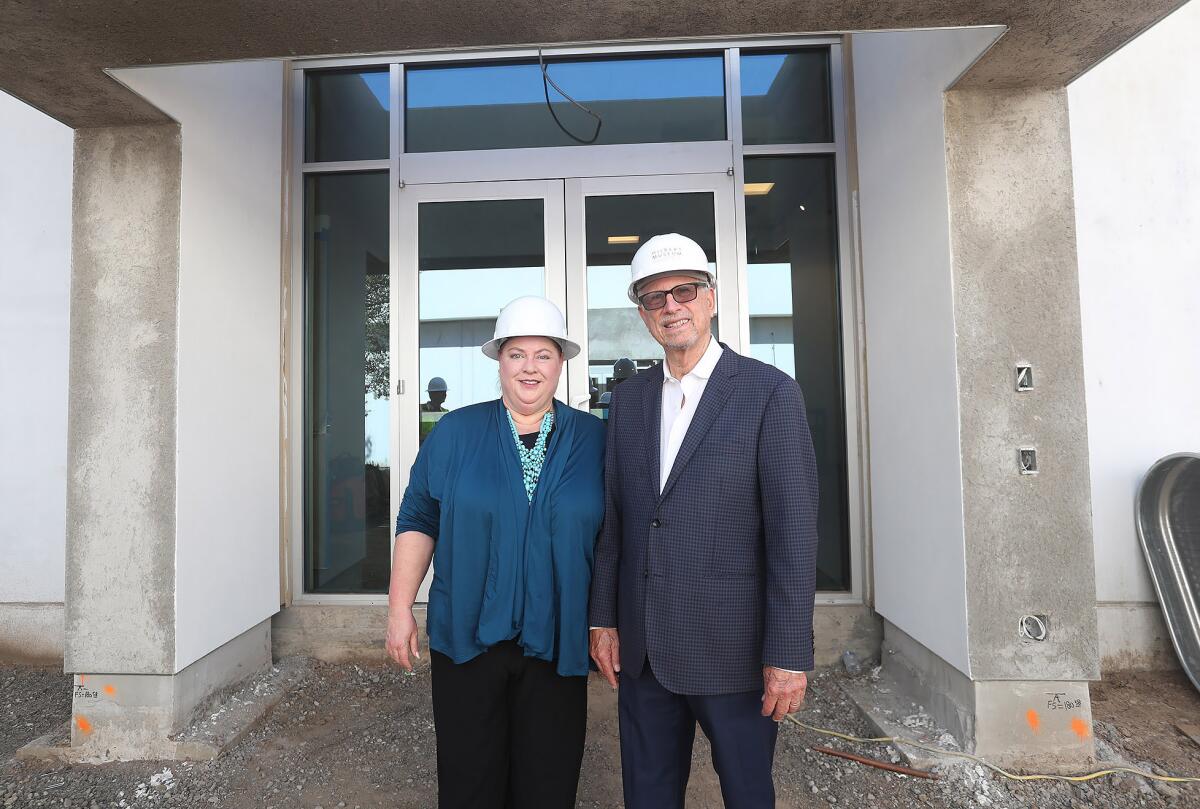 Mary Platt, museum director, and founder and donor Mark Hilbert.