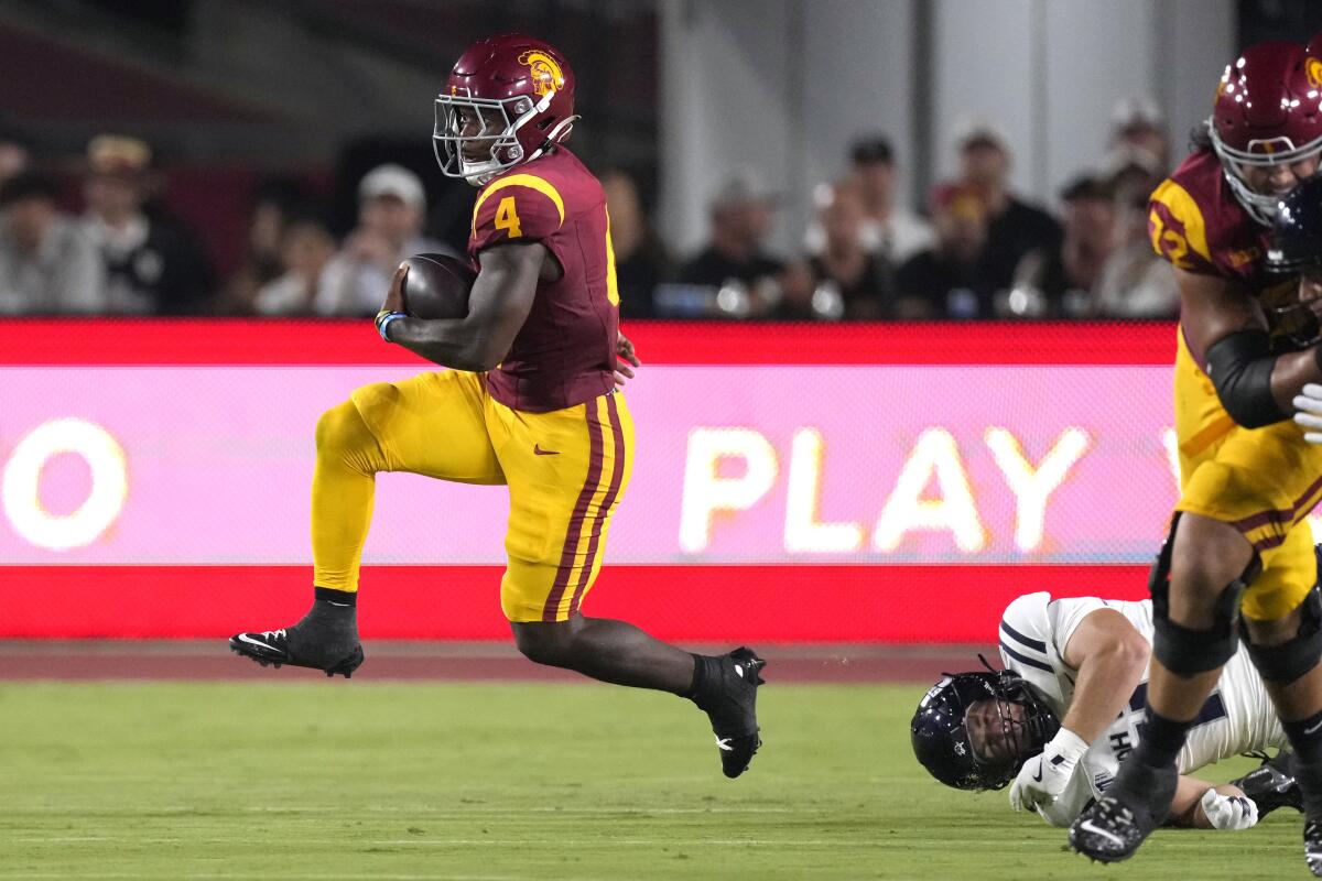 USC running back Woody Marks, left, expects to carry the ball often against Michigan on Saturday.