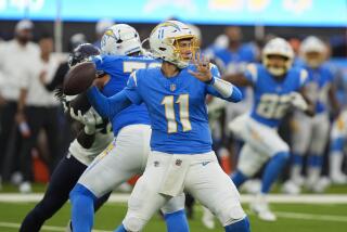 Chargers quarterback Luis Perez (11) passes against the Seattle Seahawks in their preseason game.