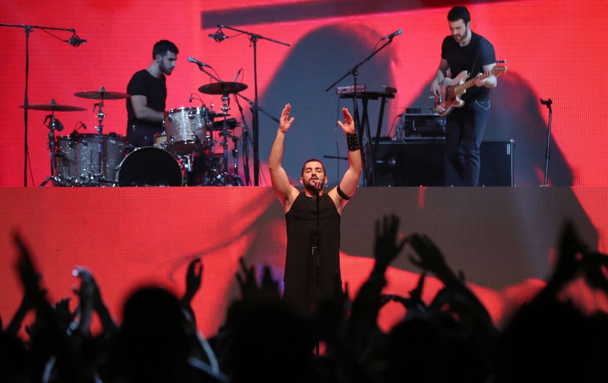 Hamed Sinno, the lead singer of Lebanese band Mashrou' Leila, performs on stage at the Dubai International Marine Club during a music festival in the United Arab Emirates in 2017. Sinno is openly gay.