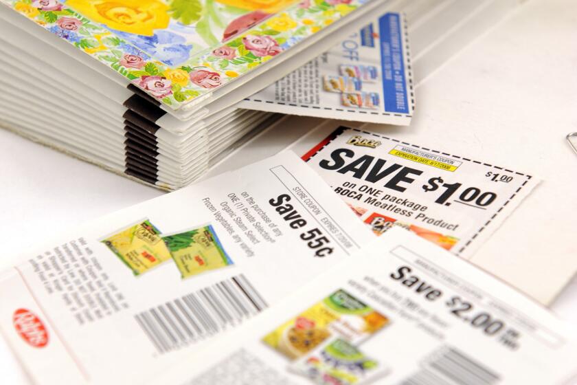 LOS ANGELES – AUG. 6, 2008 –– Tattered coupon folder used by LA TIMES reporter Nancy Rivera Brooks to organize her grocery coupons. for FI sunday story.