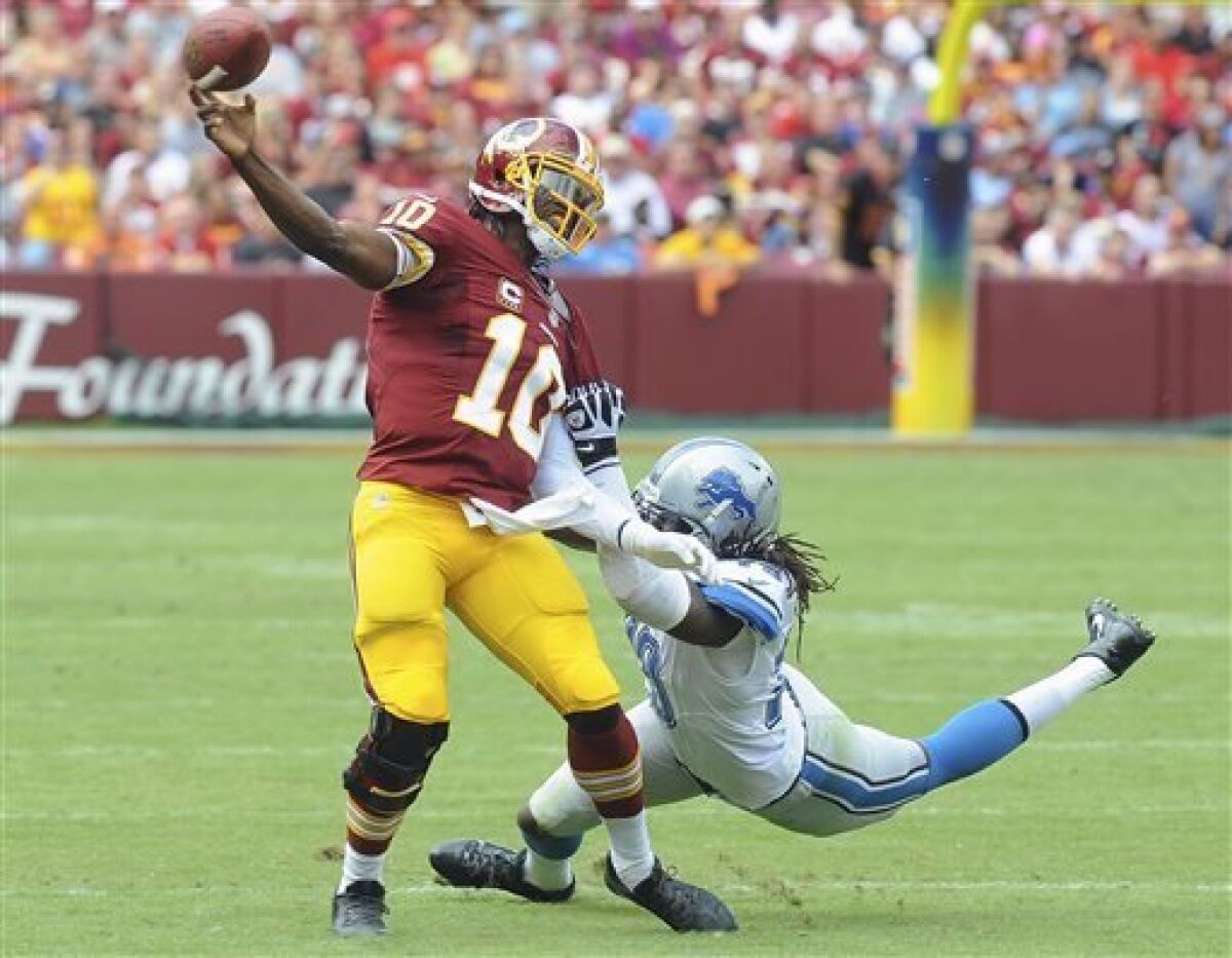 RG3 bobbles, Lions rally to top Redskins 27-20 - The San Diego