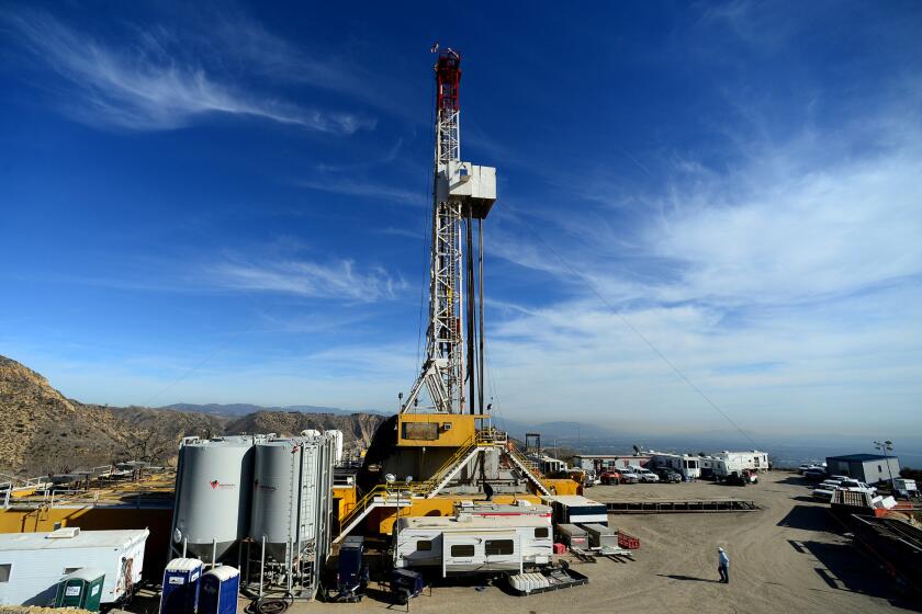 Crews work on a relief well at the Aliso Canyon facility above the Porter Ranch area of Los Angeles in December 2015.