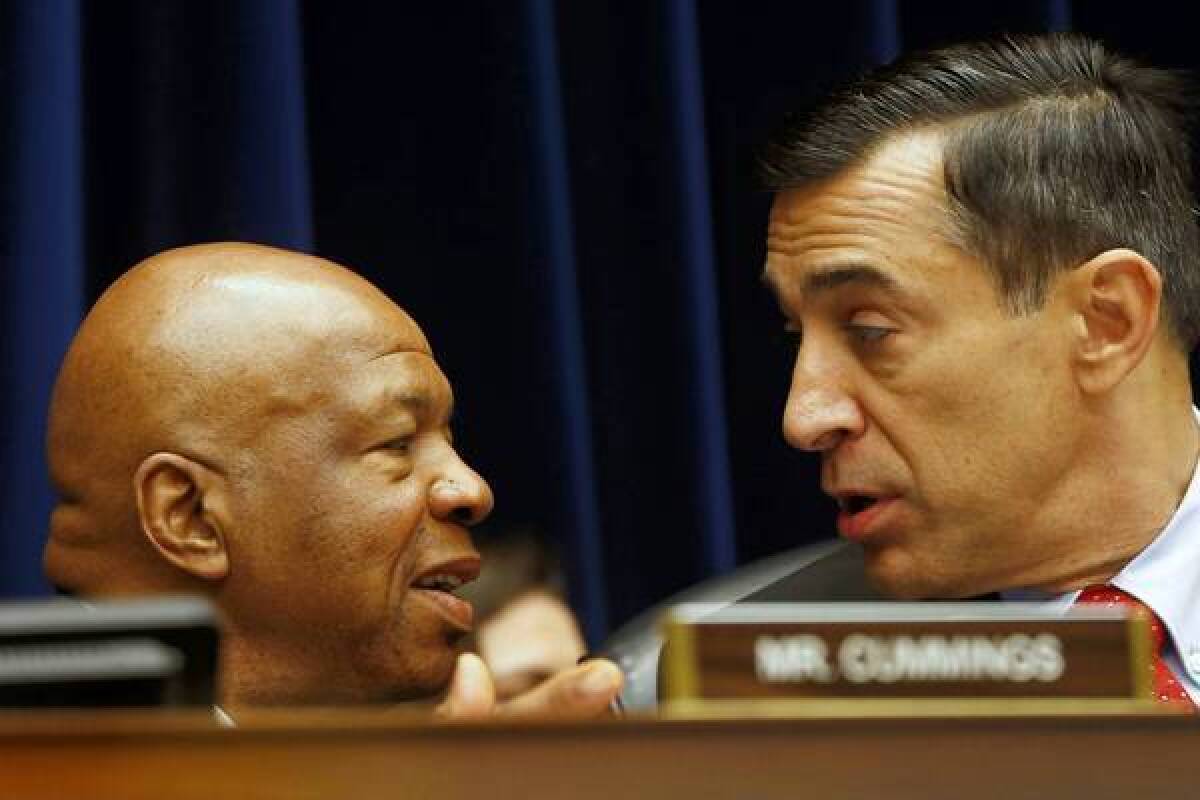 Rep. Darrell Issa (R-Vista), right, talks with Rep. Elijah E. Cummings (D-Md.). Cummings released an interview transcript Tuesday to “debunk conspiracy theories” about the improper targeting of conservative organizations by the Internal Revenue Service.