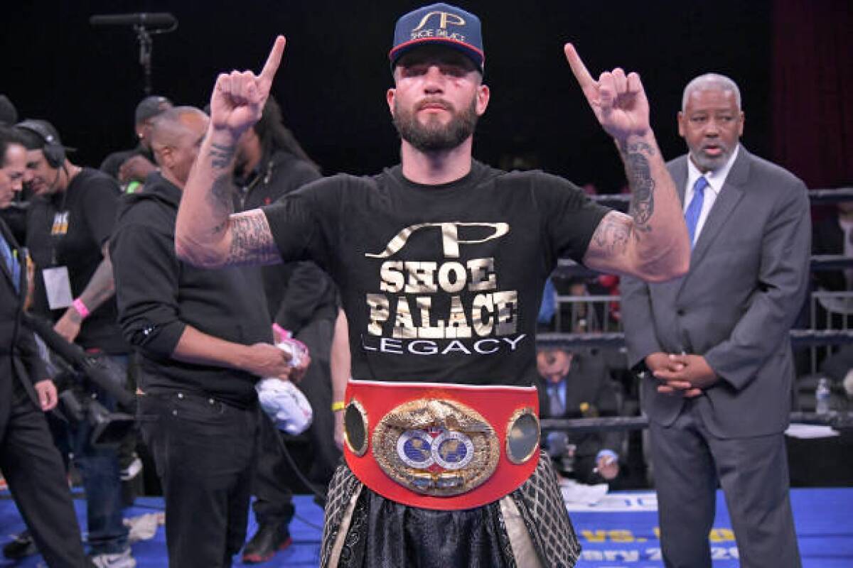 Caleb Plant celebrates after defeating Jose Uzcategui in an IBF Super Middleweight Championship match at the Microsoft Theater on January 13.
