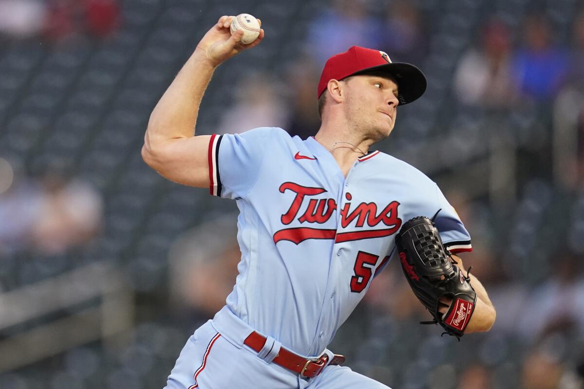 Minnesota Twins starting pitcher Sonny Gray delivers during the second inning of the team's baseball game against the Kansas City Royals, Wednesday, Sept. 14, 2022, in Minneapolis. (AP Photo/Abbie Parr)