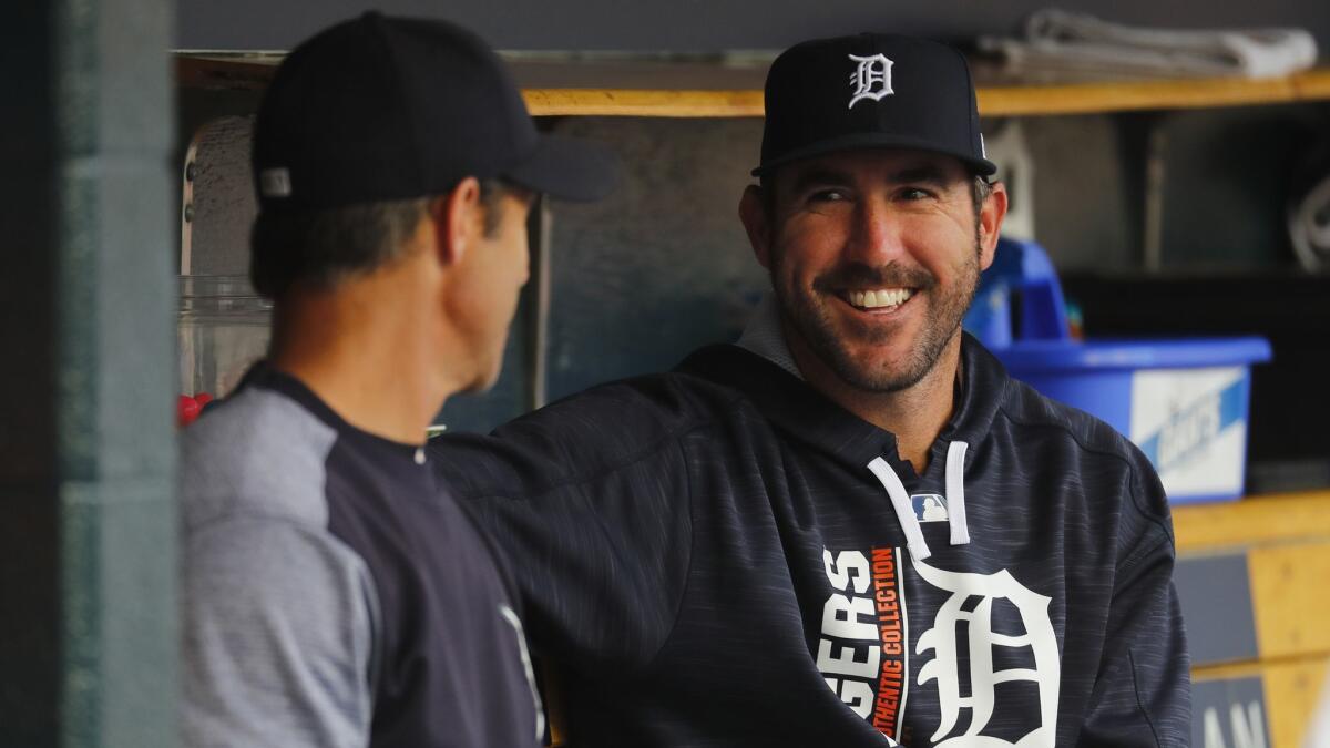 Pitcher Justin Verlander, right, talks with manager Brad Ausmus when both were with the Detroit Tigers in 2017. Ausmus is the Angels manager and Verlander is with the Houston Astros.