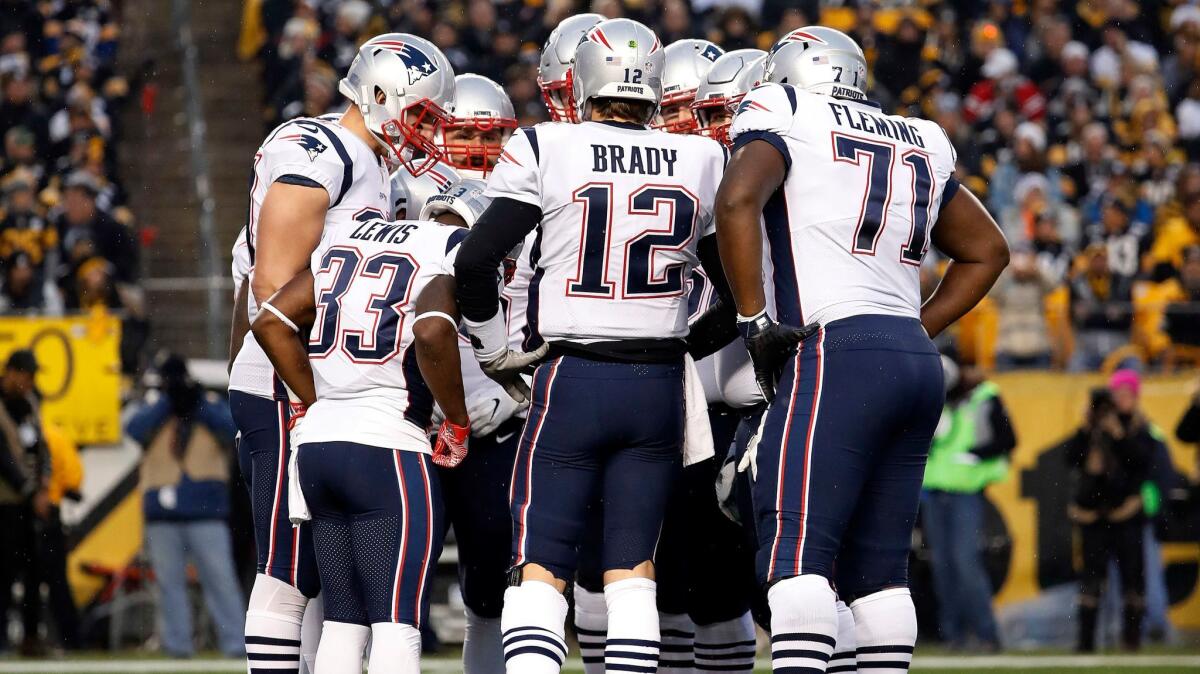 New England Patriots quarterback Tom Brady in the huddle during against the Pittsburgh Steelers at Heinz Field in Pittsburgh Sunday, Dec. 17, 2017.