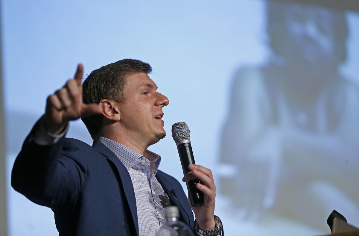 FILE - James O'Keefe, of Project Veritas, speaks at on the Southern Methodist University campus in Dallas, Nov. 29, 2017. Federal agents searched the New York homes of people tied to the conservative group Project Veritas months after the group received a diary that a tipster claimed belonged to President Joe Biden’s youngest daughter, its leader said Friday, Nov. 5, 2021. In a video posted on YouTube, O’Keefe said his organization had received a grand jury subpoena and said current and former Project Veritas employees had their homes searched by federal agents. (Jae S. Lee/The Dallas Morning News via AP, File)