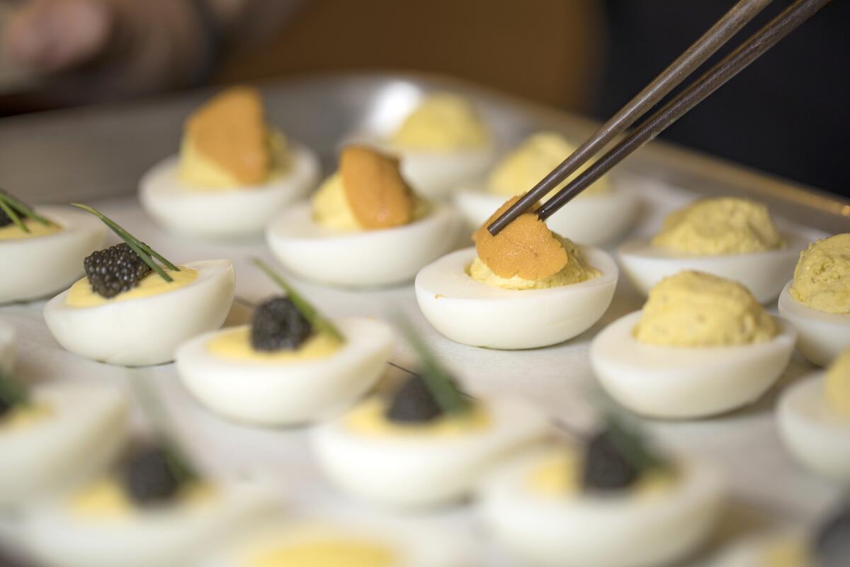 Deviled eggs, with caviar, uni and other fun things.