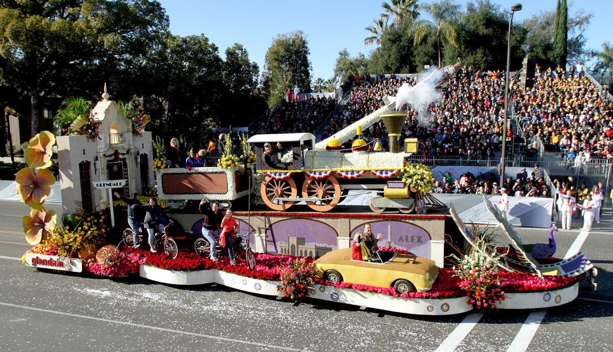The city of Glendale's float "Getting there is half the fun" rolls down Orange Grove Ave. as it starts the 5.5-mile long 2016 Rose Parade in Pasadena on Friday, Jan. 1, 2016.