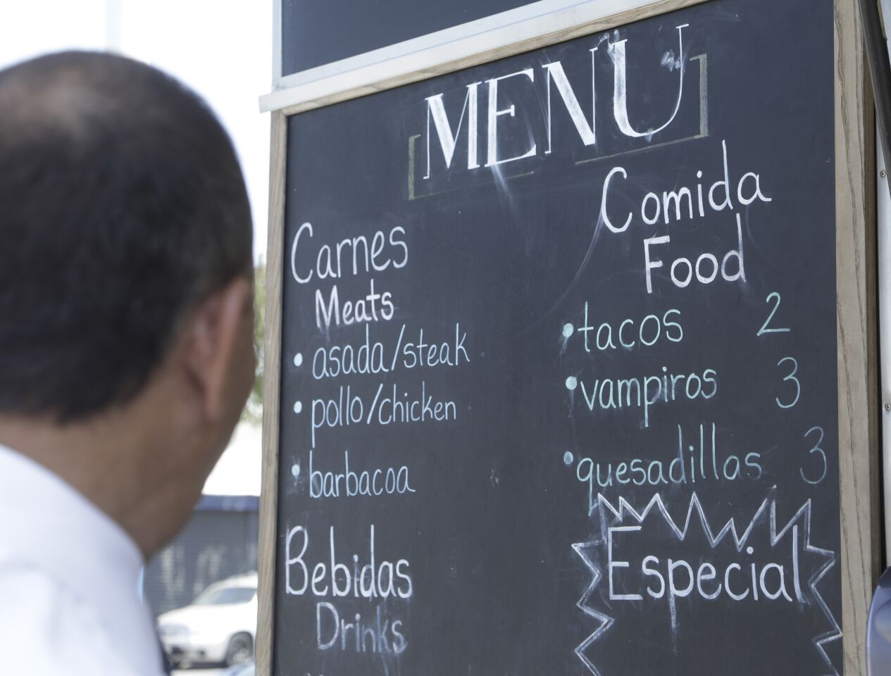A partial menu at the taco truck Asadero Chikali, a family-owned business serving breakfast, lunch and dinner in East Los Angeles.