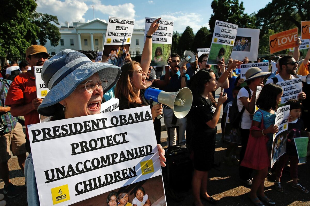 Demonstrators opposed to sending unaccompanied minor immigrants back to Central America protest in front of the White House earlier this month.