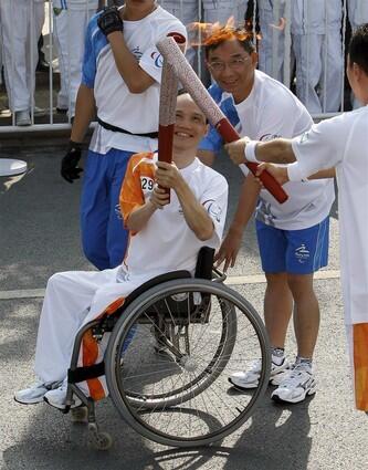 An unidentified Chinese torchbearer takes part in the Beijing 2008 Paralympic torch relay in Beijing.