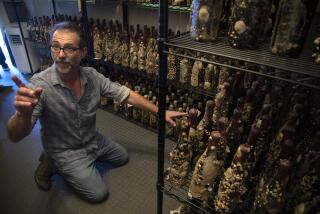 SANTA BARBARA, CA - OCTOBER 26: Emanuele Azzaretto, a co-owner of Ocean Fathoms wine in Santa Barbara, shows off the cellar with hundreds of bottles of wine aged underwater. They claim it "enhances" the wine for a noticeable change in the wine's texture and taste. Photographed on Tuesday, Oct. 26, 2021 in Santa Barbara, CA. (Myung J. Chun / Los Angeles Times)