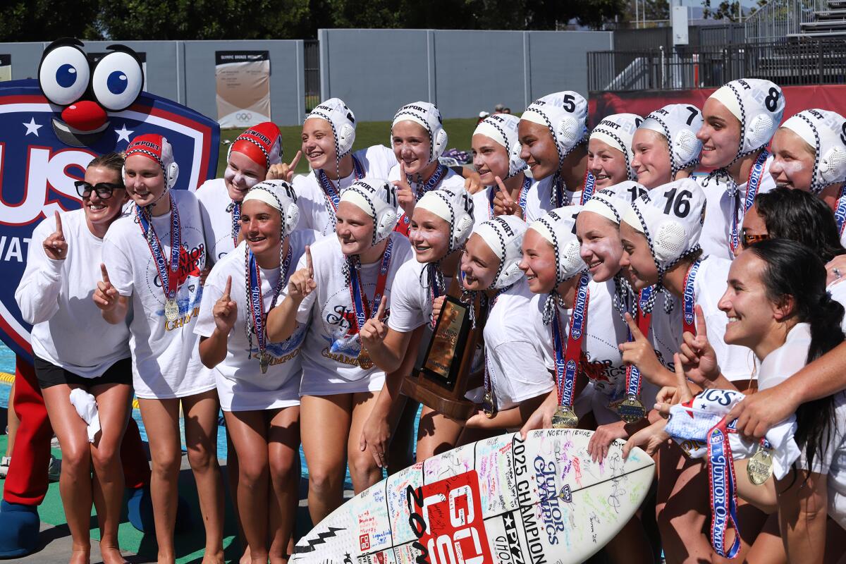The Newport Beach Water Polo Club 14-and-under girls' team poses for a picture after receiving their gold medals on Sunday.