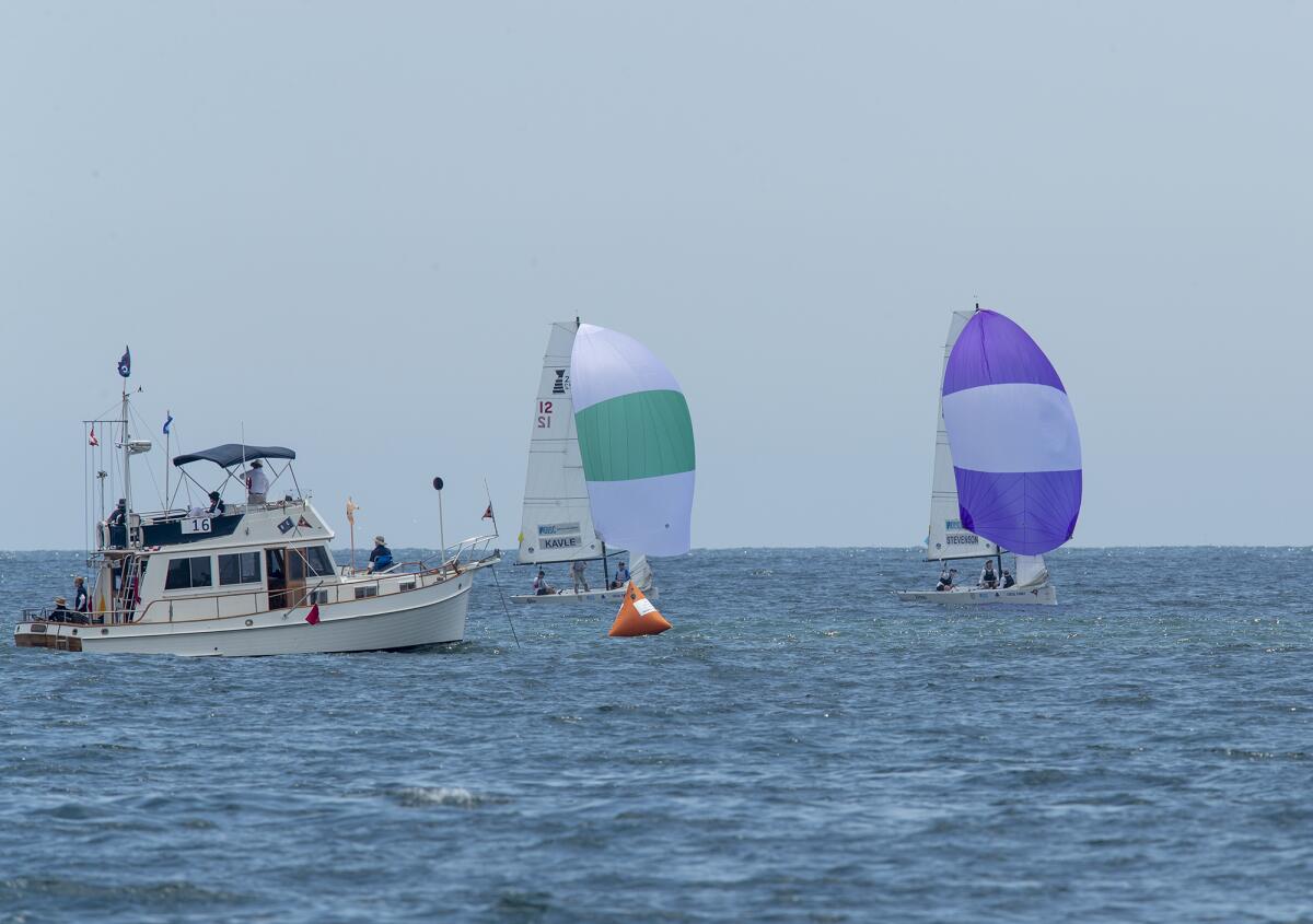 Porter Kavle's boat, left, competes against Jordan Stevenson's boat during the Governor's Cup on Thursday in Newport Beach.