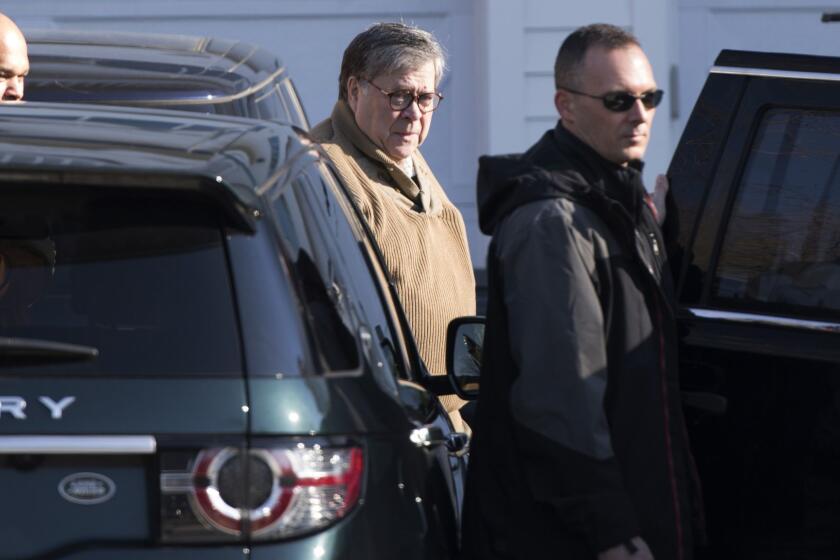 Attorney General William Barr leaves his home in McLean, Va., on Saturday morning, March 23, 2019. Special counsel Robert Mueller closed his long and contentious Russia investigation with no new charges, ending the probe that has cast a dark shadow over Donald Trump's presidency. (AP Photo/Sait Serkan Gurbuz)