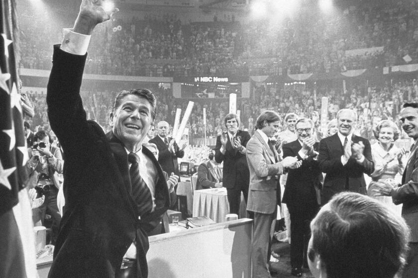 Ronald Reagan waves to supporters at the 1976 Republican Convention in Kansas City, Mo.