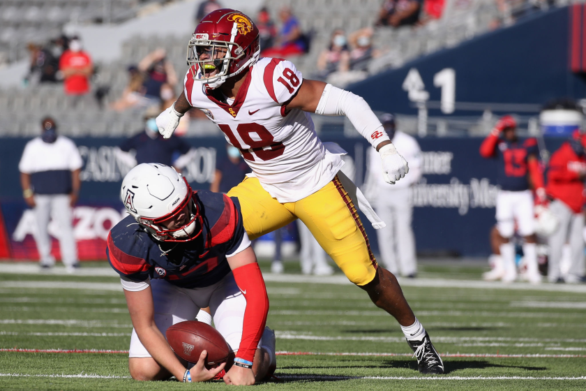 USC linebacker Raymond Scott celebrates after sacking Arizona quarterback Grant Gunnell on Nov. 14 in Tucson, Arizona.