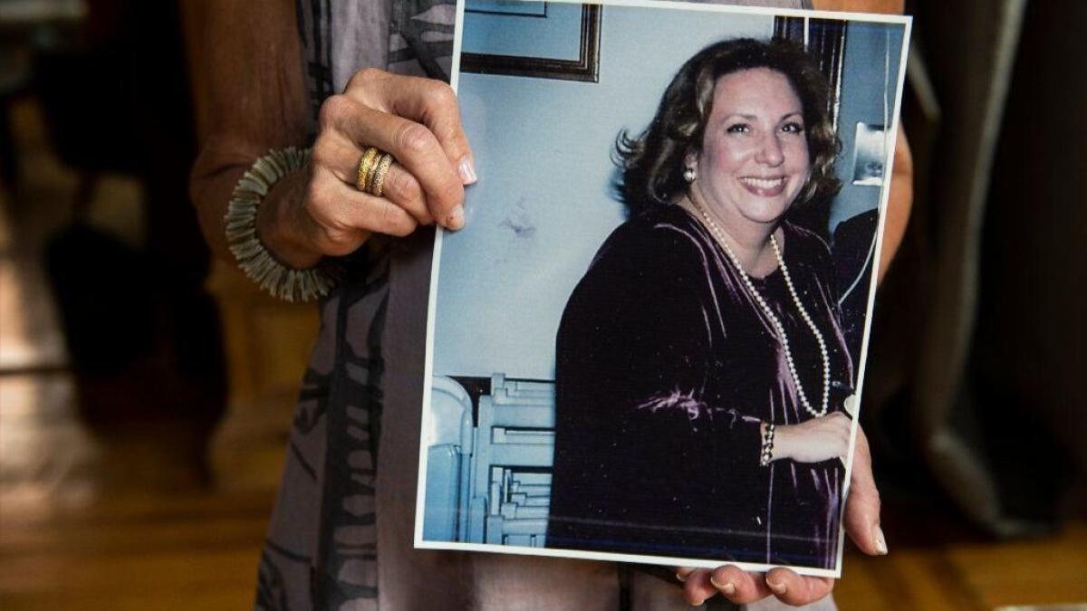 In July 2018, Melinda Watman shows a photograph from her 40th birthday, five years before she had bariatric surgery.