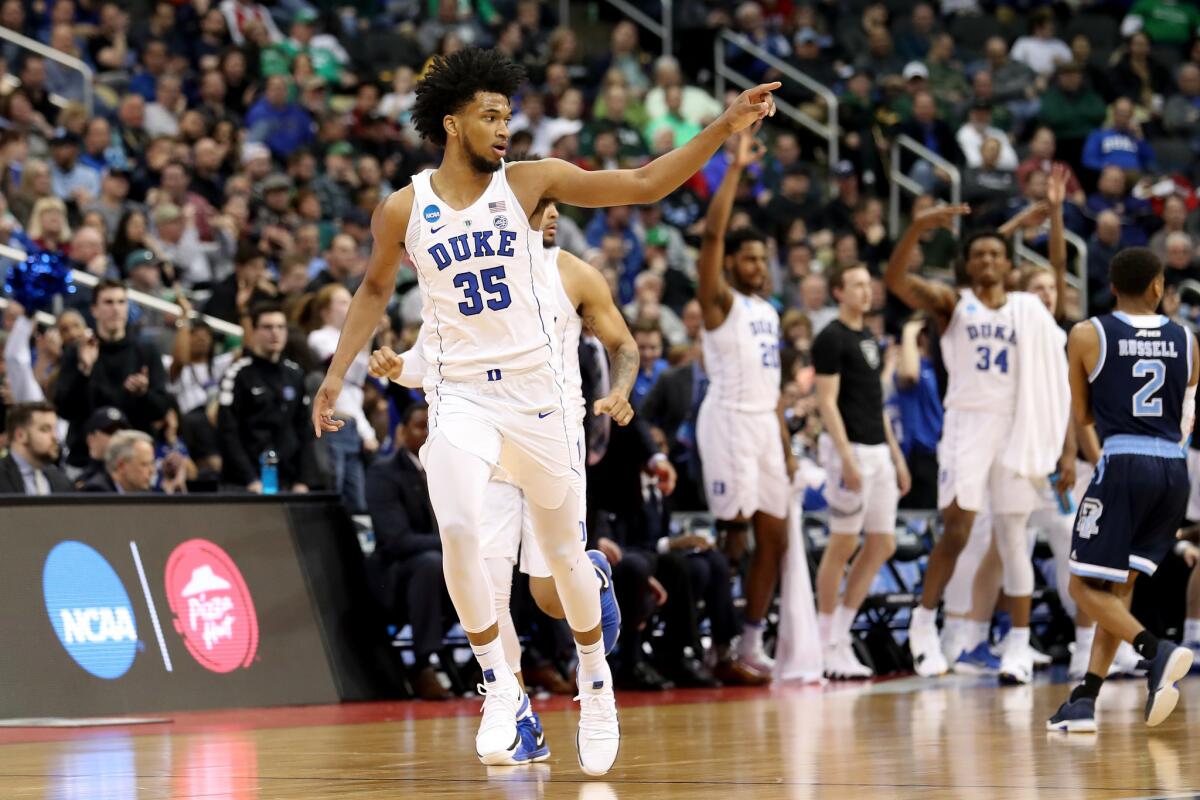 Duke's Marvin Bagley III celebrates making a three-point shot against Rhode Island during the second half Saturday.