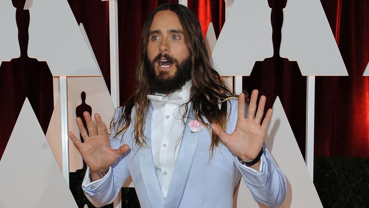 Oh no! Jared Leto's hair is no longer the flowing mane he sported two weeks ago at the Oscars. Damn you, scissors ...