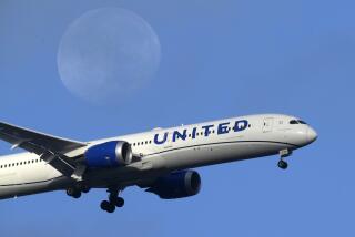 FILE - A United Airlines Boeing 787 approaches for landing in Lisbon, Sept. 2, 2023, with the setting moon in the background. Don't have enough airline miles for that free flight? United Airlines is now letting people pool and share their frequent-flyer points with family and friends, the airline announced Thursday, March 21, 2024. (AP Photo/Armando Franca, File)