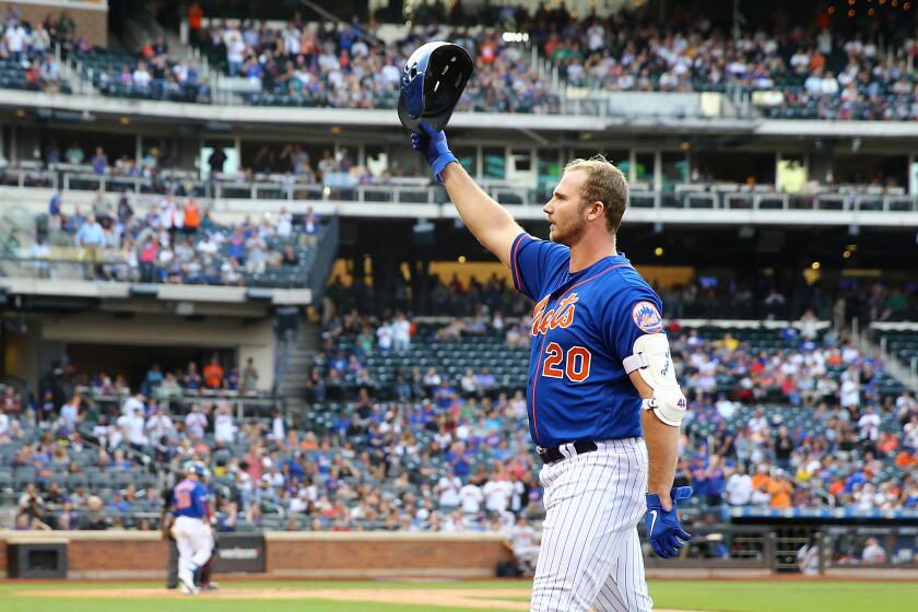 Pete Alonso of the New York Mets waves to the crowd after flying out to left field during the eighth inning of a game Sept. 29 against the Atlanta Braves at Citi Field. 