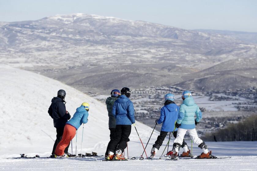 Skiers look down from the top of Park City Mountain Resort, which has been combined with Canyons and is now called just Park City.