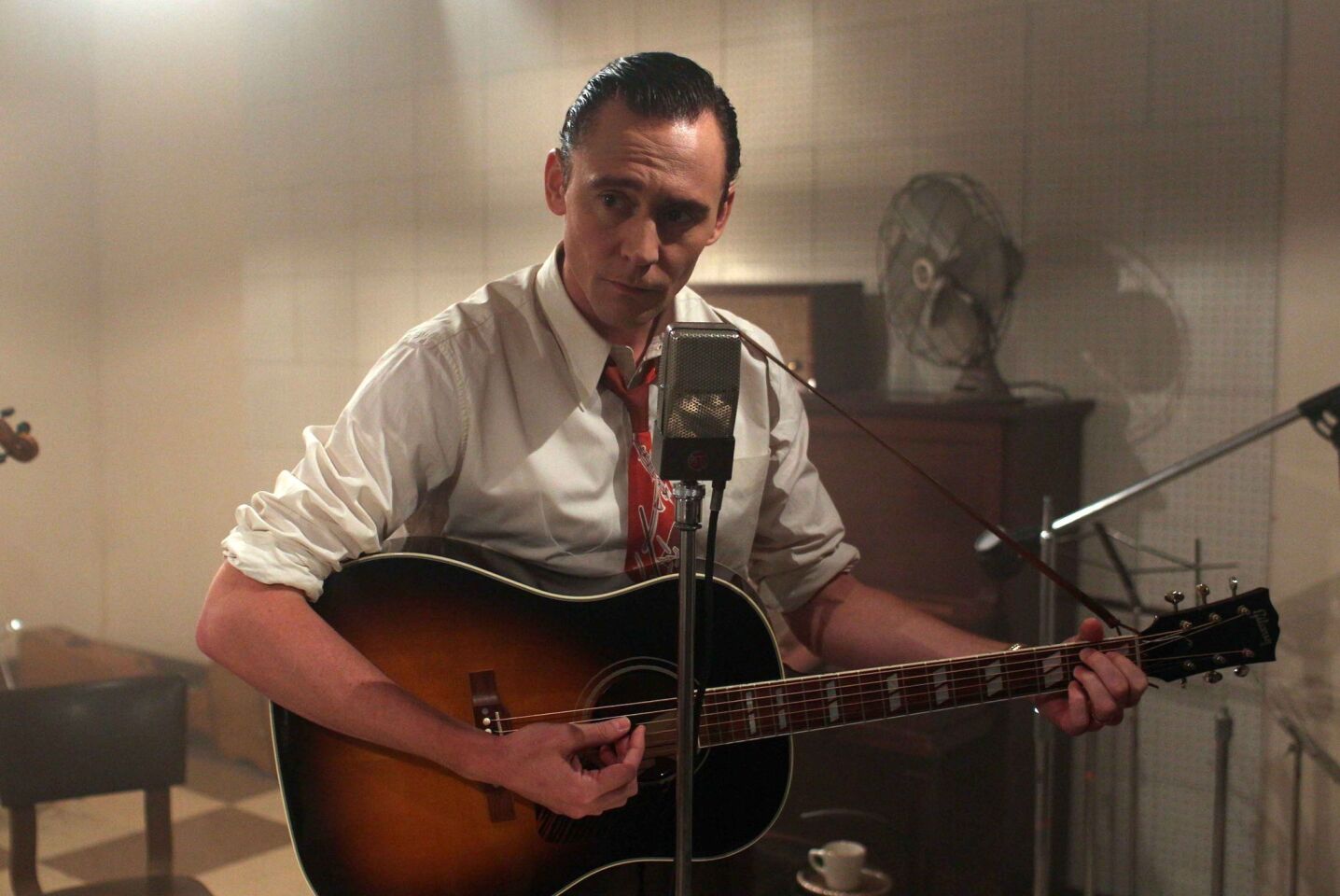 In "I Saw the Light," Tom Hiddleston, best known for his role as Loki in the Marvel Cinematic Universe, portrays country music pioneer Hank Williams, who died at age 29.