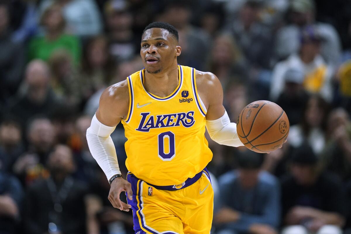 Lakers guard Russell Westbrook brings the ball up during a game against the Jazz 