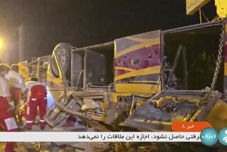 This image taken from a video released by Iranian state television shows the aftermath of a bus crash near Taft, Iran, early Wednesday, Aug. 21, 2024. A bus carrying Shiite pilgrims from Pakistan to Iraq crashed in central Iran, killing multiple people, an official said Wednesday. (Iranian state television via AP)