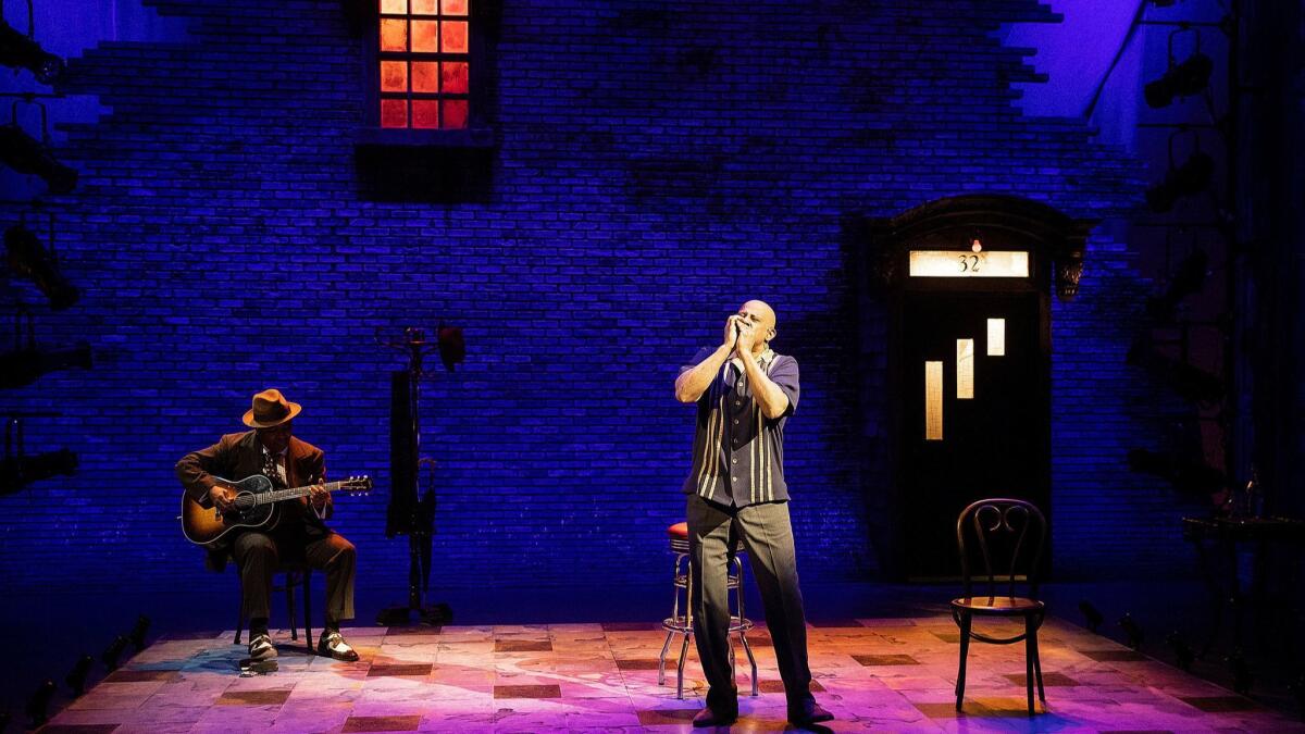 Ruben Santiago-Hudson with guitarist Chris Thomas King at the Mark Taper Forum.