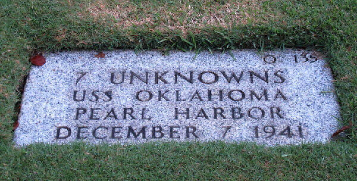 At the National Memorial Cemetery of the Pacific in Honolulu, a single gravestone marks the resting place of seven unidentified victims of the 1941 attack on Pearl Harbor.