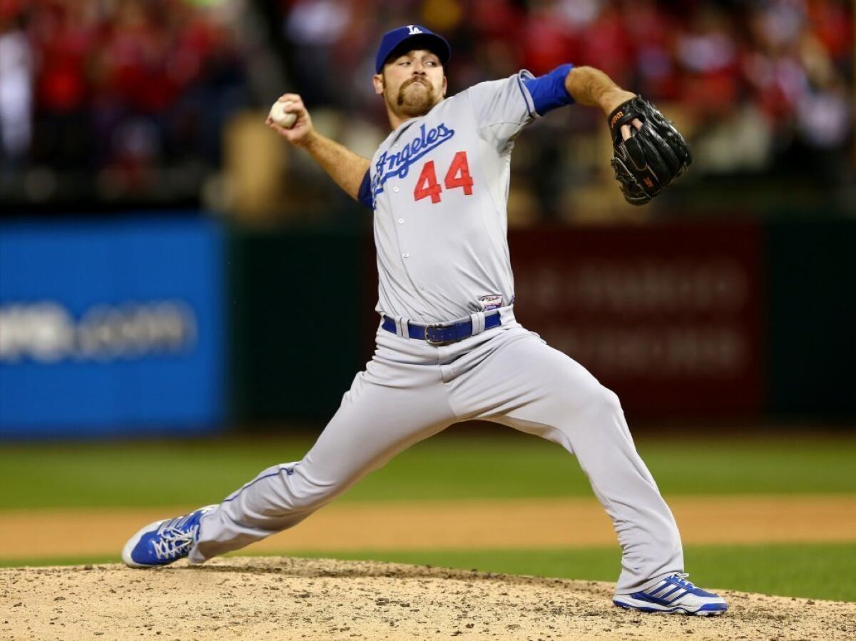 Chris Withrow pitches against the St. Louis Cardinals on Oct. 18.