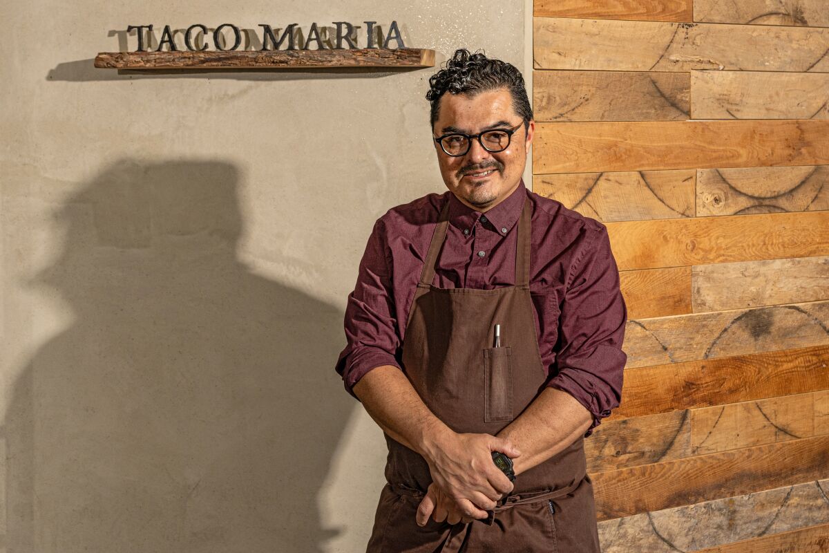 Chef and Owner Carlos Salgado in front of Taco Maria 