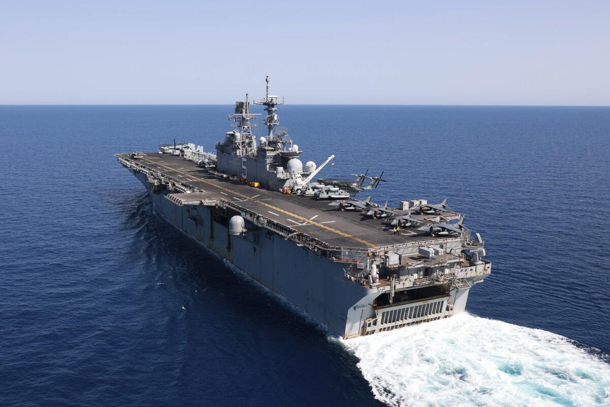 In this photo released by the U.S. Navy, the amphibious assault ship USS Bataan travels through the Red Sea