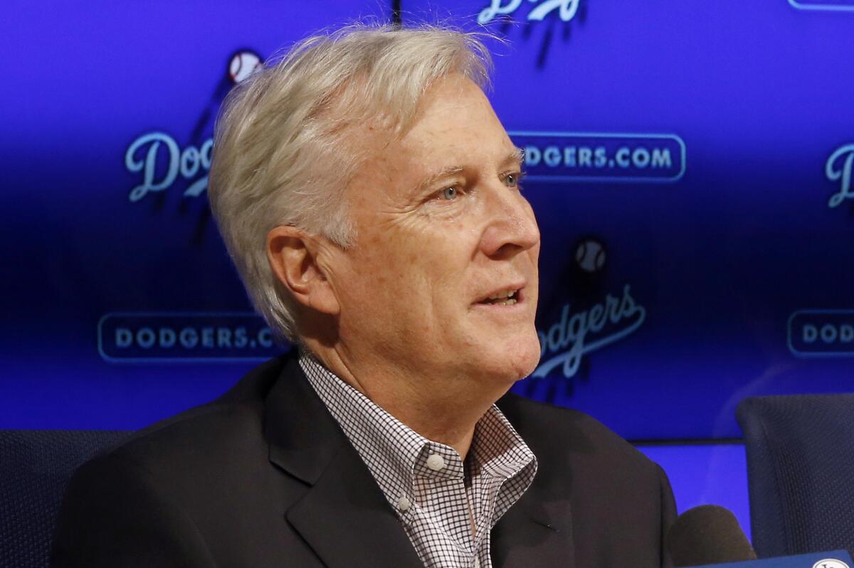 Dodgers owner and chairman Mark Walter speaks during a news conference.