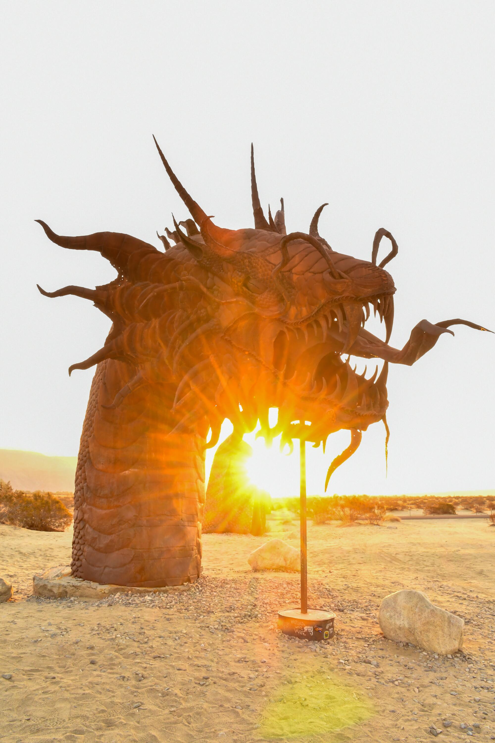 A dragon sculpture out of the ground 