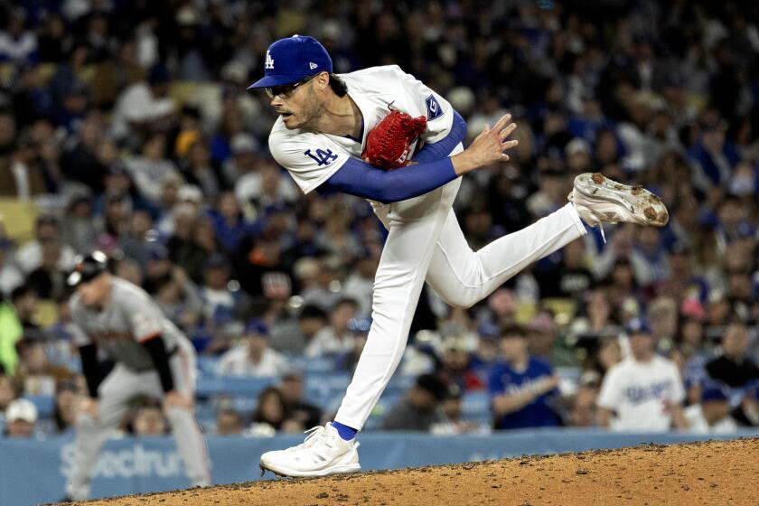 LOS ANGELES, CA - APRIL 1, 2024: Los Angeles Dodgers relief pitcher Joe Kelly (99) pitches.