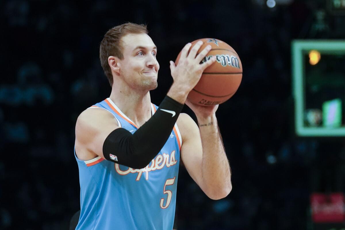 The Clippers' Luke Kennard competes in the All-Star weekend three-point shootout Saturday night in Cleveland. 