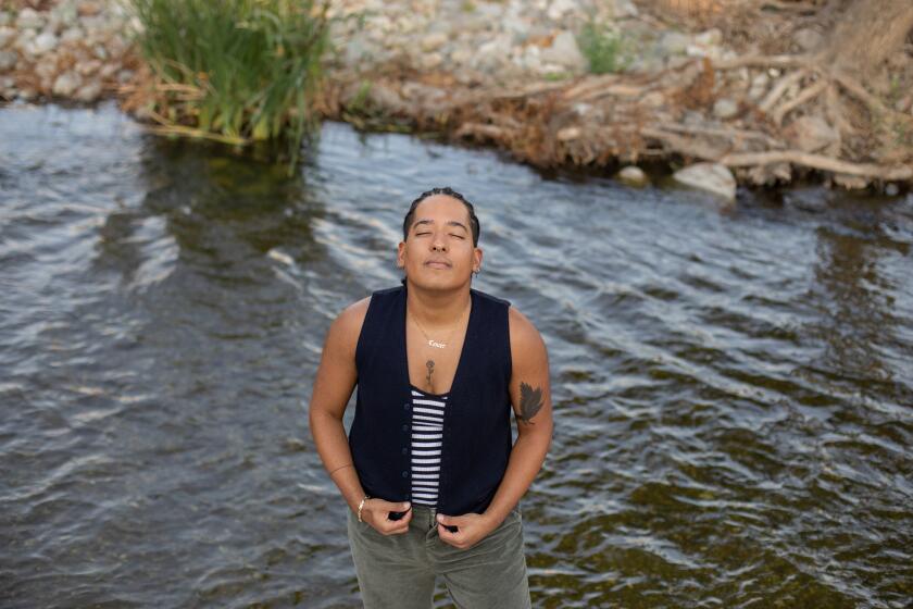 LOS ANGELES, CA - SEPTEMBER 01: Lil Kalish (they/them) poses for a portrait at Los Angeles River on Thursday, Sept. 1, 2022 in Los Angeles, CA. (Jason Armond / Los Angeles Times)