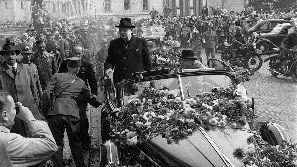 British Prime Minister Winston Churchill is welcomed by thousands as he arrives Sept. 19, 1946 in Zurich, Switzerland.